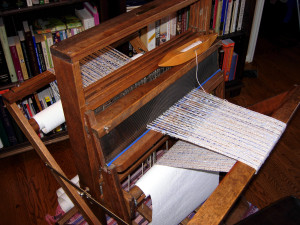1960's-era Dorset loom made by F. C. Wood with 4 harnesses and a direct tie-up to 4 treadles. 
